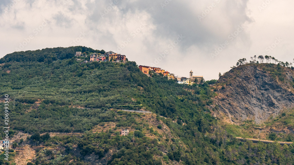 little village on steep hill in italy