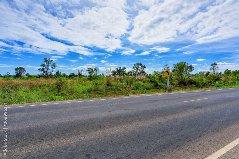 Fototapeta premium Asphalt road side view and landscape countryside.
