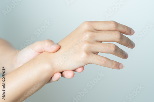 woman wrist arm pain. office syndrome healthcare and medicine concept