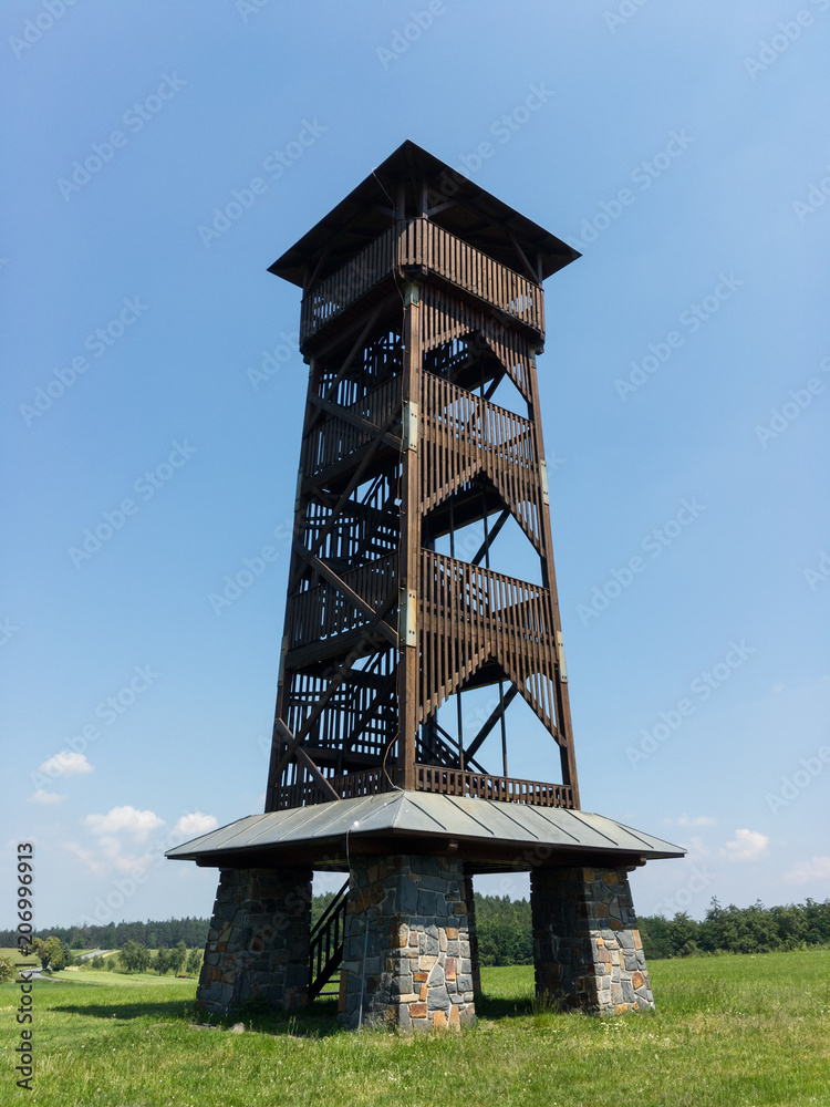 Lookout tower / observation tower, Jakubcovice, near Hradec nad Moravici, Czech Republic / Czechia - high and tall building for touristic observation. Landmark in the beatiful sunny nature