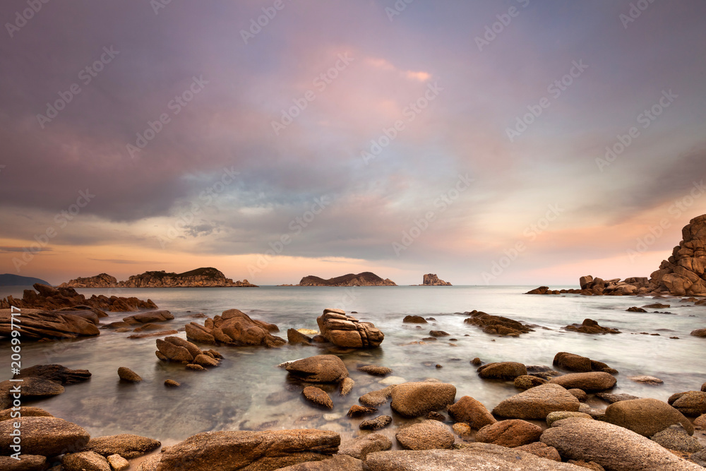 Beautiful landscape photo of amazing bay with sea rocks, sky clouds and soft water