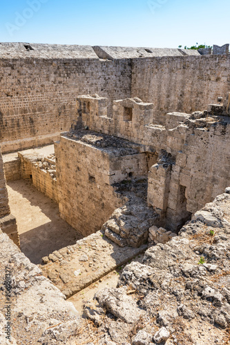 Ruins of city walls next to Grand master palace (Rhodes, Greece) photo