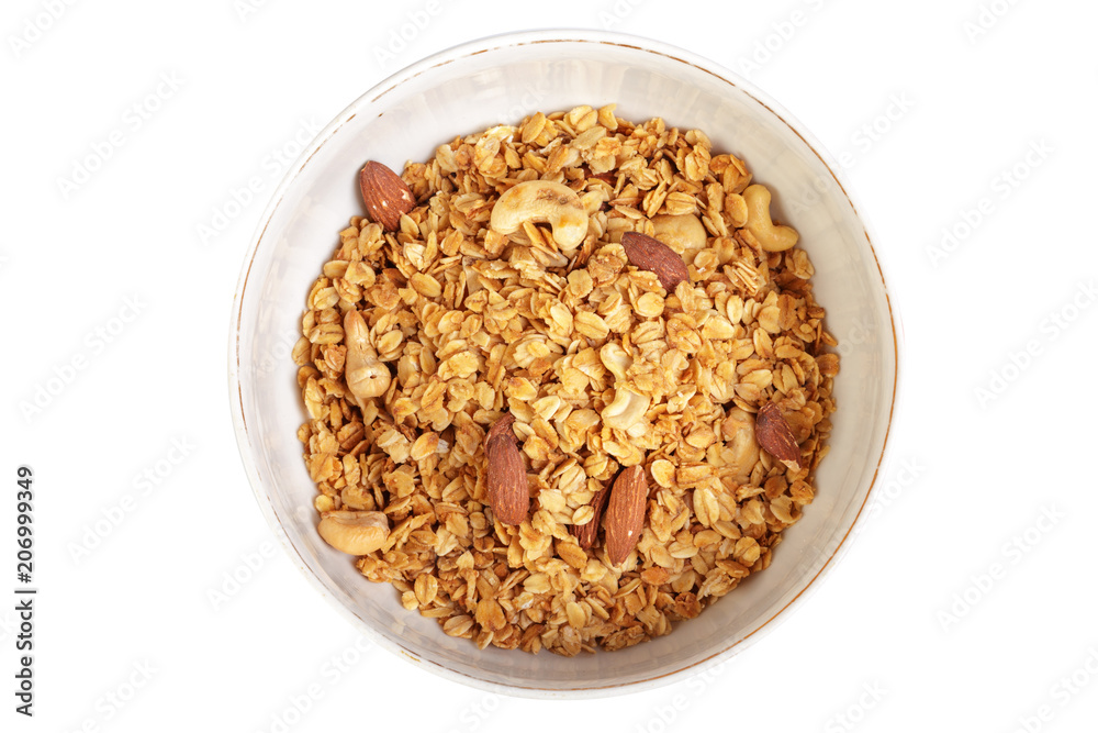 Bowl of whole grain muesli isolated on white background Bowl of whole grain muesli isolated on white background
