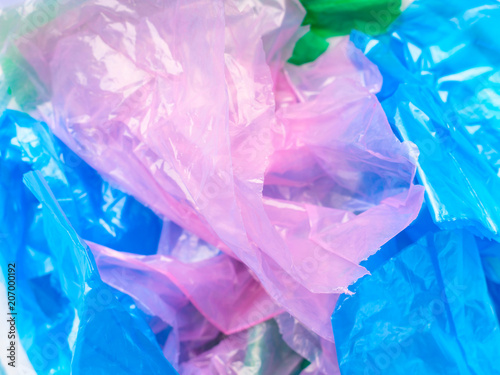 Colorful pastic bags texture closeup. Plastic use or disposal concept