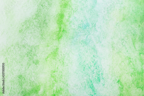 Green watercolor background. by drawing