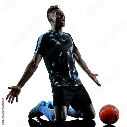 one african soccer player man playing in studio isolated on white background