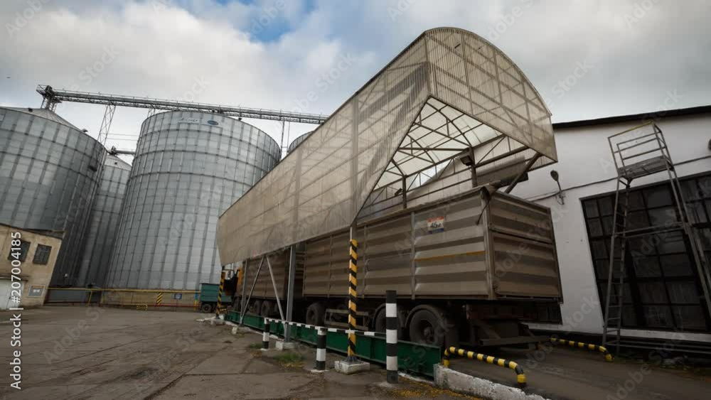 Timelapse of probe tester plunges into the truck trailer to collect wheat for quality analysis. Automatic control system, testing machine at mill, bakery, bread factory or grain elevator terminal. Timelapse of probe tester plunges into the truck trailer to collect wheat for quality analysis. Automatic control system, testing machine at mill, bakery, bread factory or grain elevator terminal.