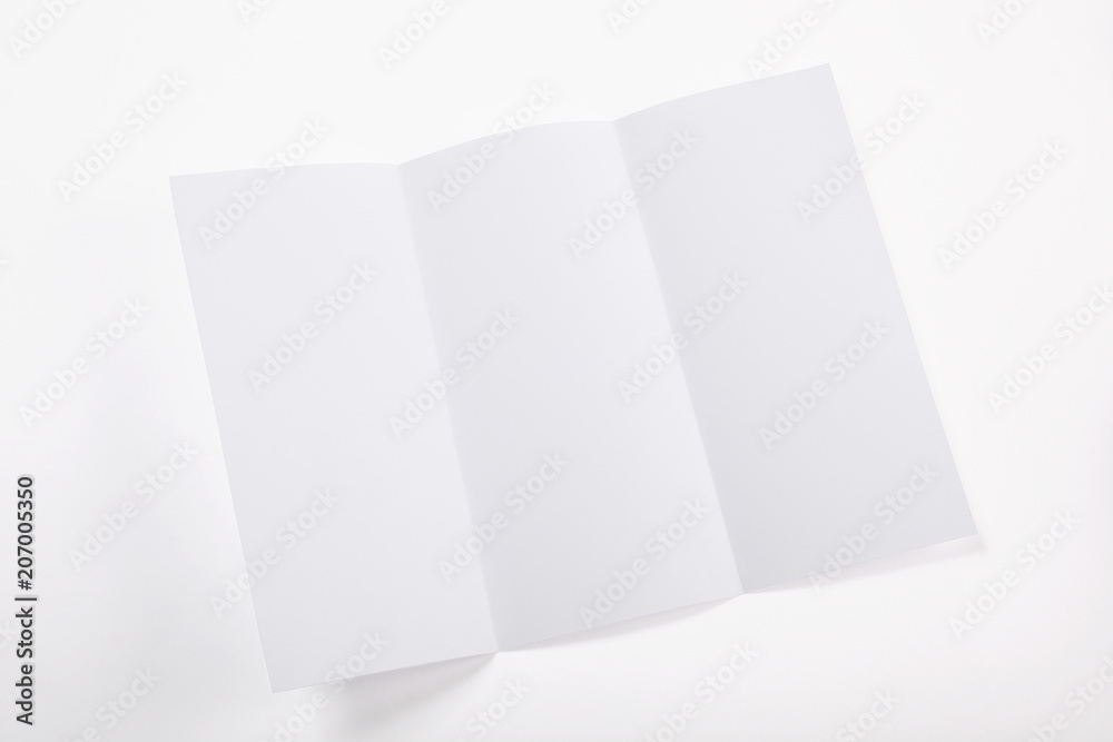 white folded paper sheet isolated on white background with l copy space white folded paper sheet isolated on white background with l copy space