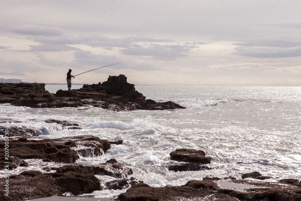 pesca en la playa caleta
