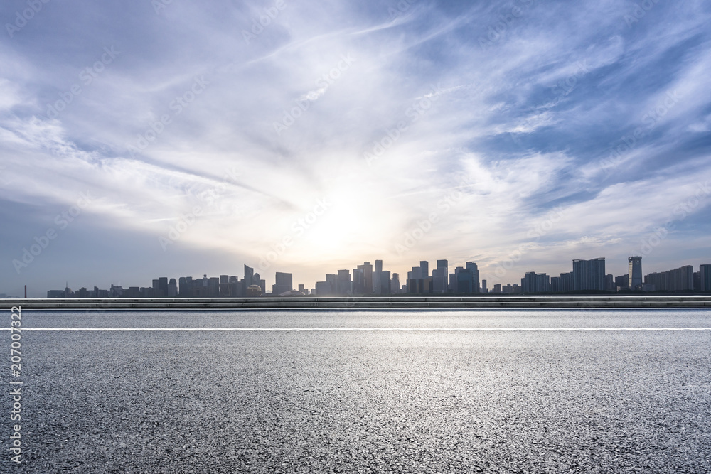 Fototapeta premium empty asphalt road with modern office building