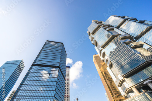 Photography up view of modern glass building in hongkong china
