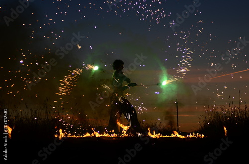 The Kecak Fire Dance at Uluwatu Temple, Bali, Indonesia photo