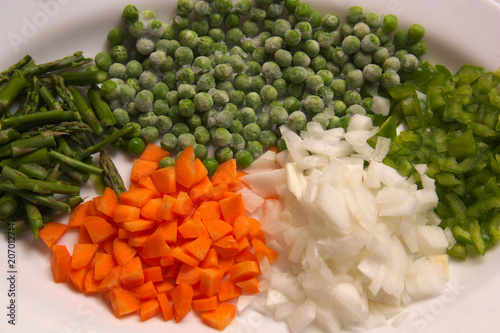 Various chopped vegetables for cooking.