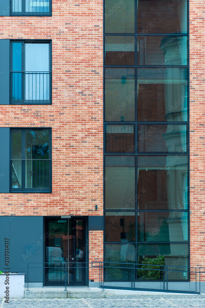 Fototapeta premium modern brick multistory building in a European city