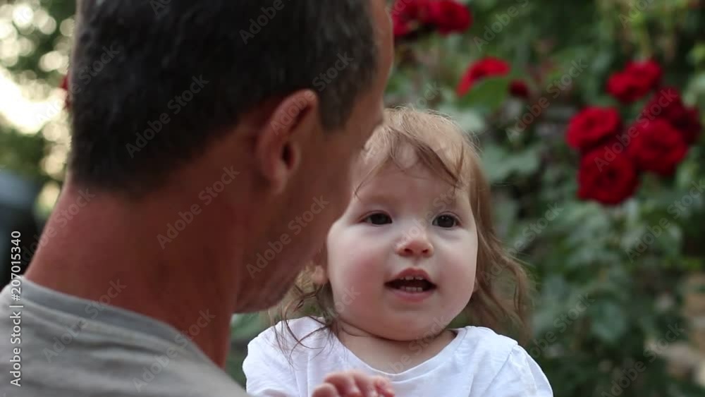 Happy father with daughter. 40+ year old father and baby Happy father with daughter. 40+ year old father and baby