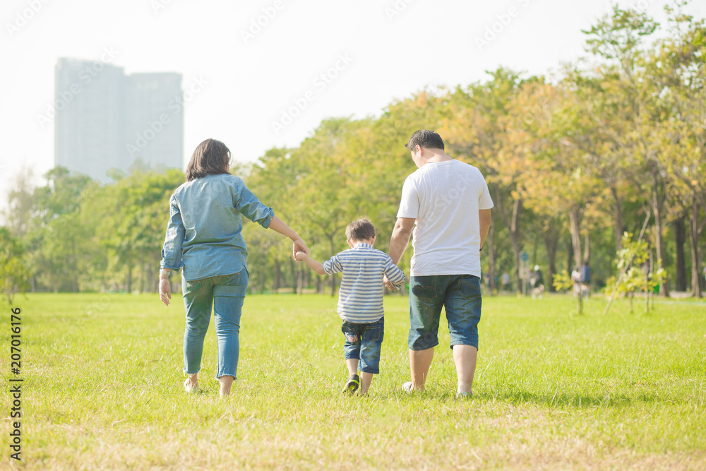 Mother playing with son in the field. Happy family life style concept. Mother playing with son in the field. Happy family life style concept.