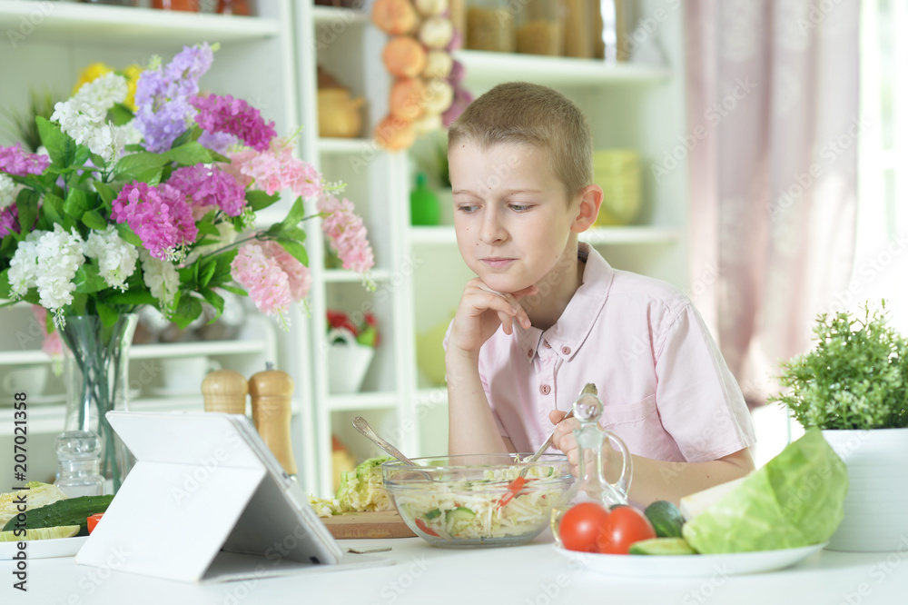 Cute little boy making dinner Cute little boy making dinner
