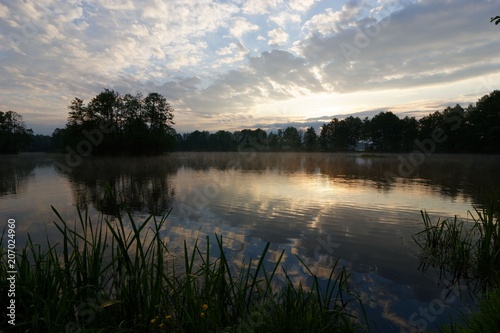 Lake durring cloudy sunrise
