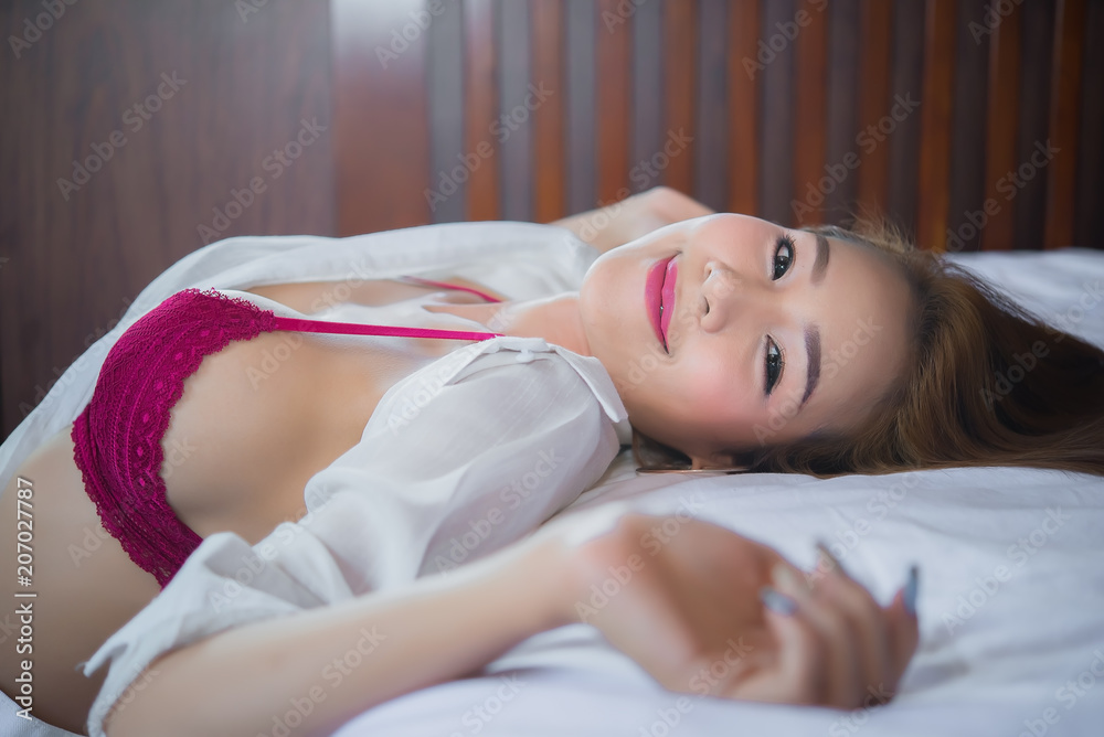 Portrait of beautiful asian sexy woman in the bedroom,Thailand people,Pose for take a picture, Portrait of beautiful asian sexy woman in the bedroom,Thailand people,Pose for take a picture,