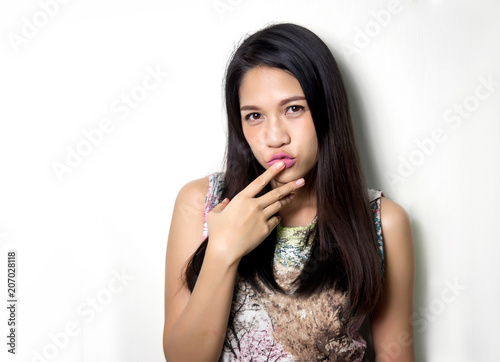 cute asian lady smile with pink lipstick on studio shot.