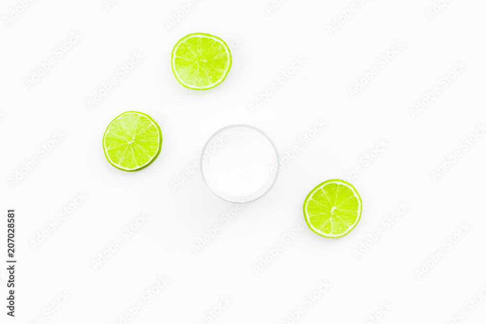 Organic citrus cosmetics for skin care. Lemon or lime moisturising cream on white background top view copy space