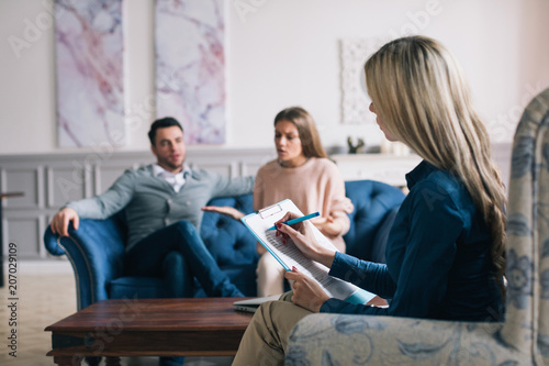 Professional psychologist conducting a consultation.