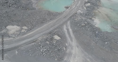 Aerial drone view of copper or other rock mining area with ponds in Asia photo