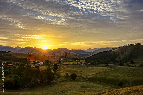 Wallpaper Mural Sunset in valley between hills in Sao Bento do Sapucai - Sao Paulo - Brazil - Panorama photo Torontodigital.ca