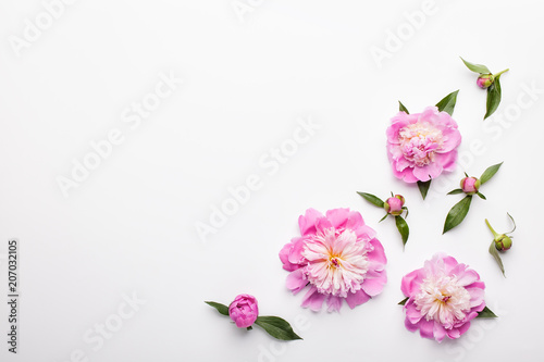 Flowers composition. Pattern made of pink peony flowers on white background. Flat lay, top view.