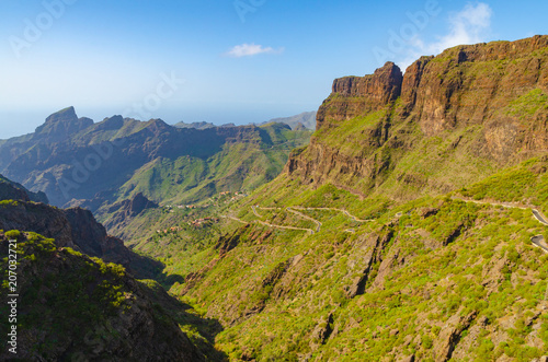 Winding road leading to a small village between the mountains, Tenerife, Canary Islands, Spain