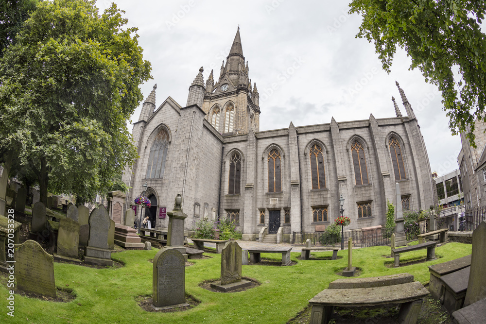 Beautiful view of the Kirk of Saint Nicholas Uniting and a graveyard in Aberdeen, Scotland.