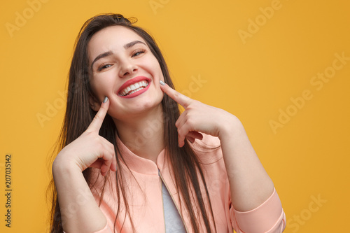 Charming girl making smile photo