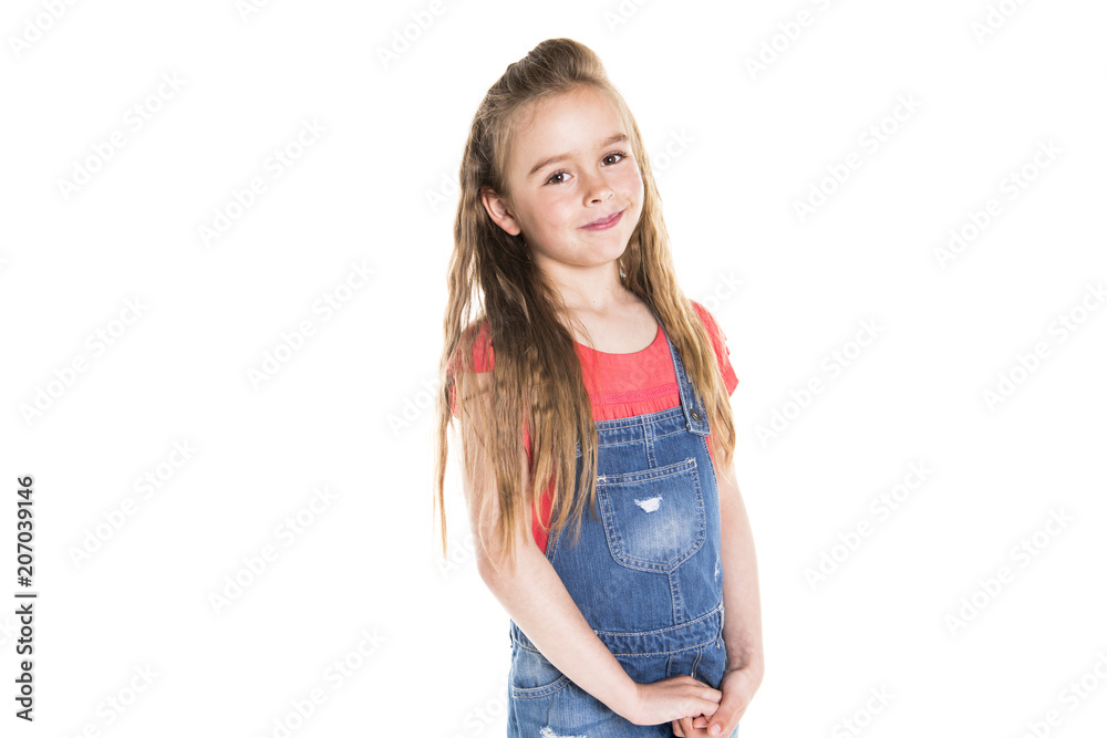 Fototapeta premium Portrait of a cute 7 years old girl Isolated over white background