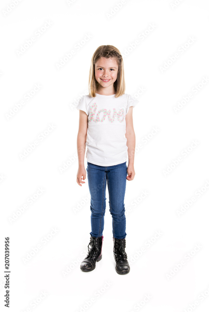 Portrait of a cute 7 years old girl Isolated over white background Stock  Photo