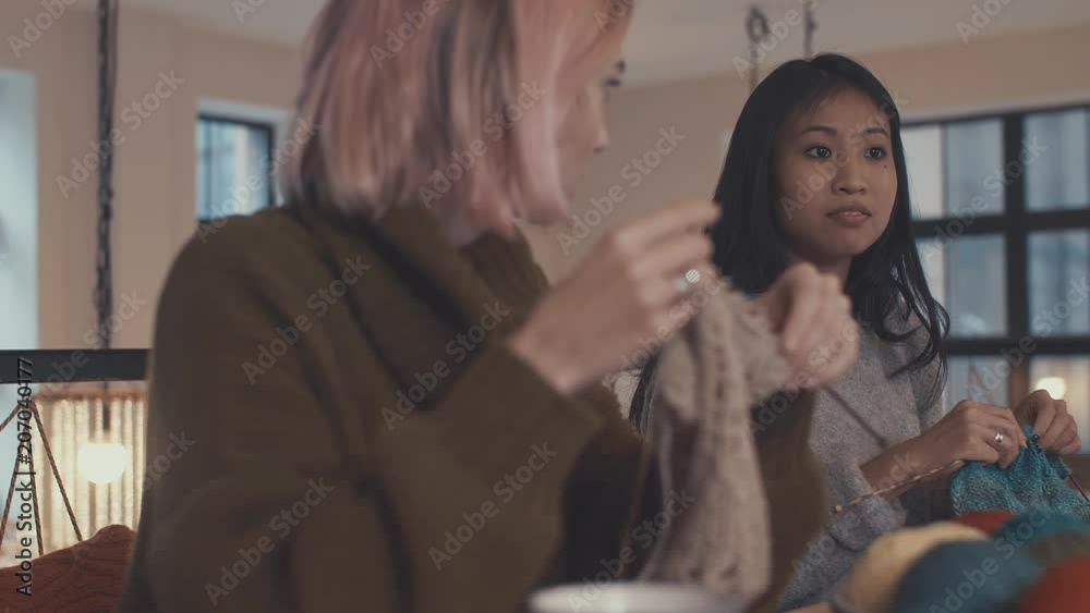 15. Young attractive women in a knitting lesson 15. Young attractive women in a knitting lesson