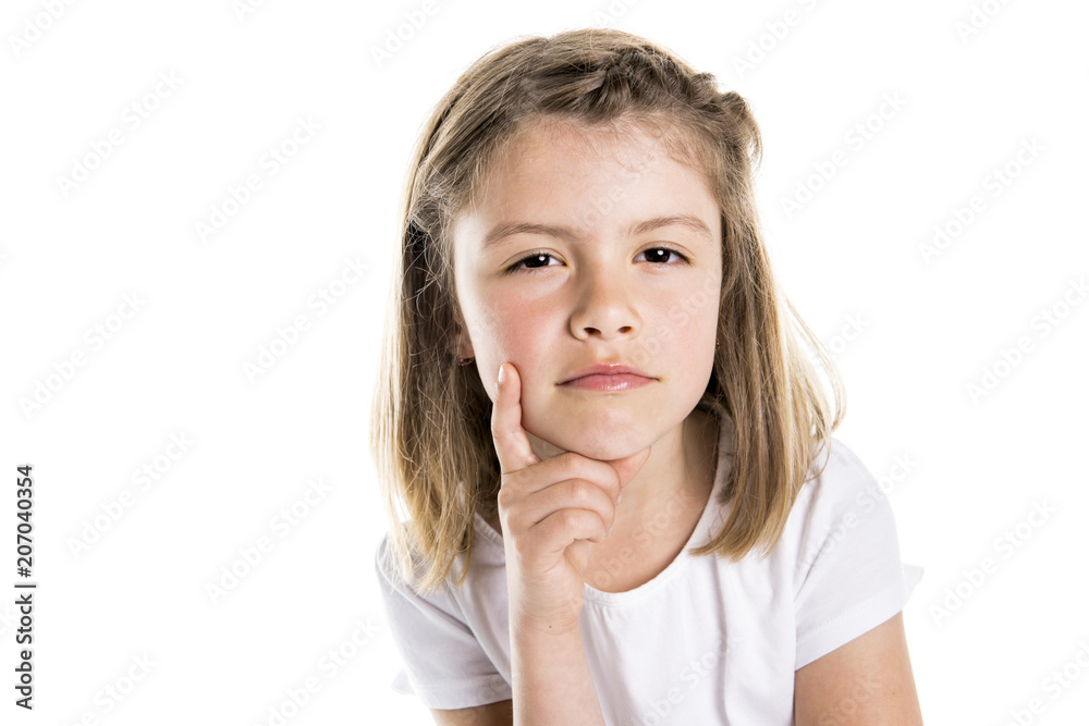 Portrait of a cute 7 years old girl Isolated over white background pensive Portrait of a cute 7 years old girl Isolated over white background pensive