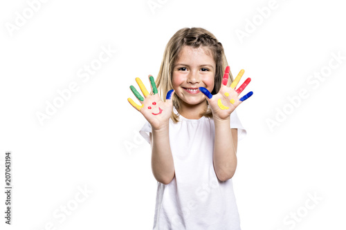smiling girl with the palms painted by a paint. Isolated on white background