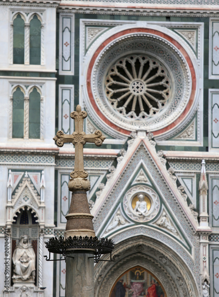 Florence Italy cross with the background of the cathedral