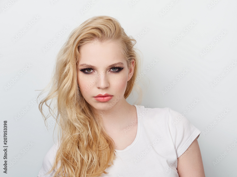 Beauty portrait of model with trendy natural make-up. Fashion shiny highlighter on skin, sexy gloss lips make-up. Beauty portrait of model with trendy natural make-up. Fashion shiny highlighter on skin, sexy gloss lips make-up.