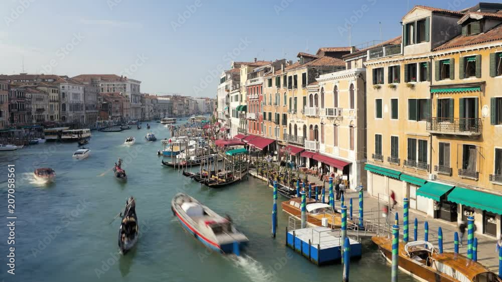 T/LTour boats traveling on Grand Canal near Rialto Bridge, Venice, Veneto, Italy T/LTour boats traveling on Grand Canal near Rialto Bridge, Venice, Veneto, Italy