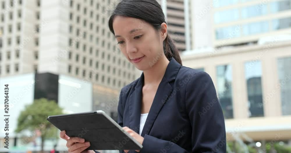 Businesswoman use of tablet computer Businesswoman use of tablet computer
