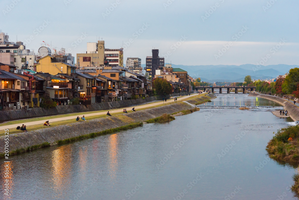 View of the embankment of the river Kamo, Kyoto, Japan. Copy space for text.