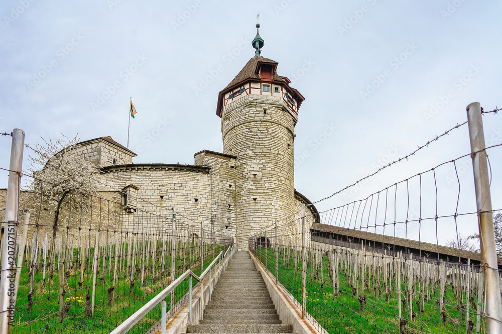 stairway leading to The circular stone fortress of Munot with blue sky, near Rhine river . Towers high above the medieval town of Schaffhausen, Switzerland. It was favorite attraction city’s landmark.