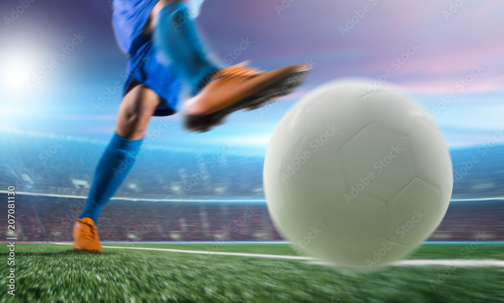 Soccer player in action kick ball at stadium.