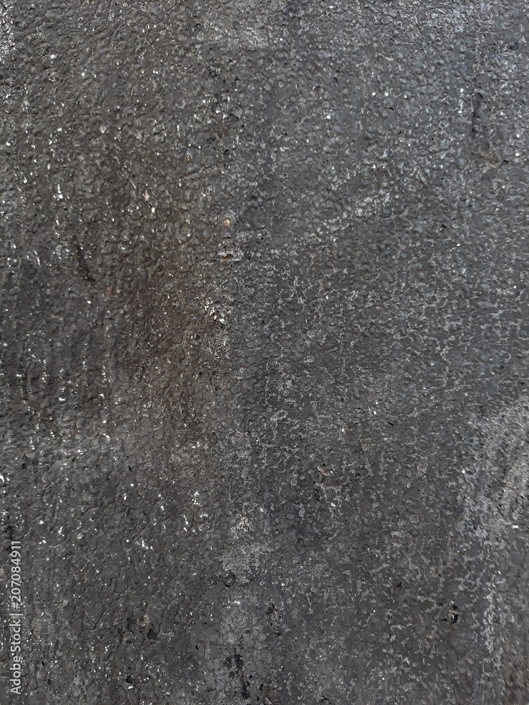 Fototapeta premium abstract distressed decor background. asphalt texture dark grey scratched plaster design. free space concept