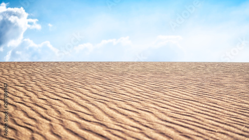 desert sand pattern flat horizon blue sky