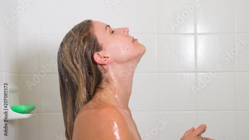 Attracitve woman in the shower.