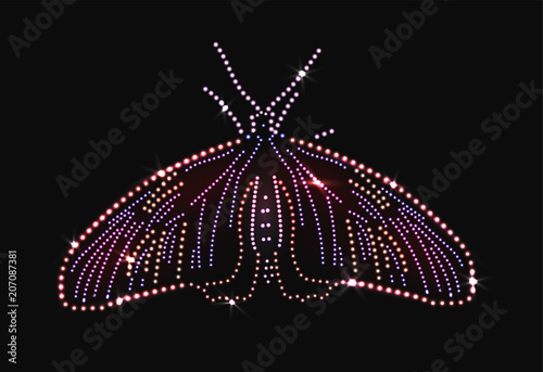 Butterfly made with precious gems on black background