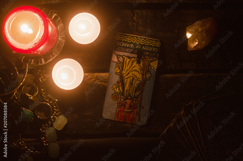Fototapeta premium Queen of wands inverted Tarot card. Fortune teller.