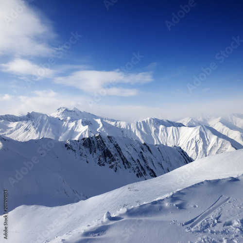 Snowy mountains and blue sky © BSANI